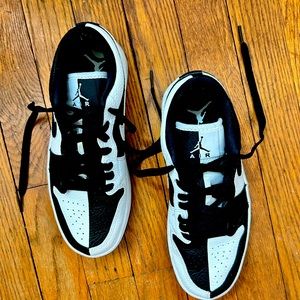 Women’s black and white air Jordan’s. Worn once or twice no box, no tag.